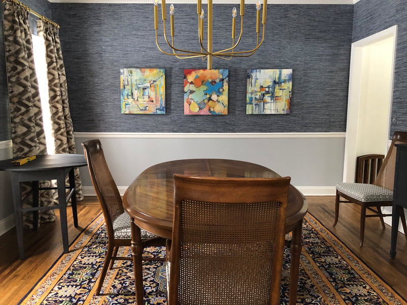 3 abstract oil paintings by Sarah Baptist just installed in dining room